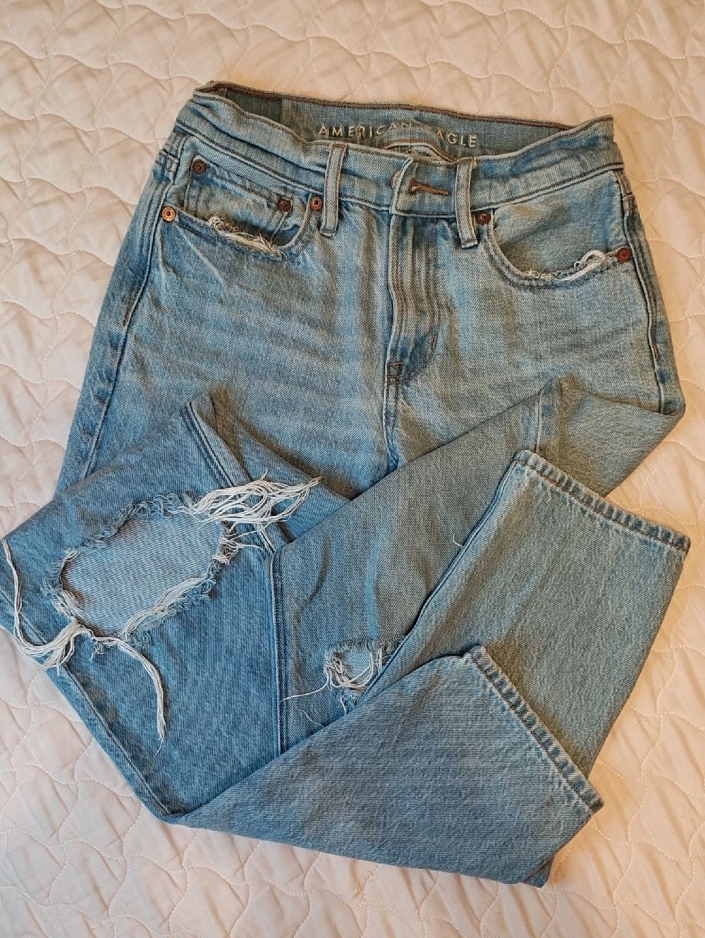 American Eagle Light Blue Denim Jacket with Tan Stitching and Metal Buttons